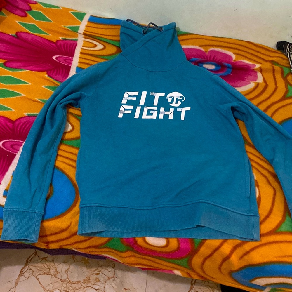 Judy size is a medium brand name is Max Color is Blue green mix